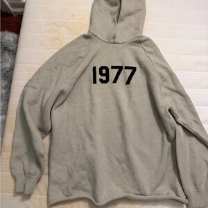 Essentials Light Tan Hoodie with Black '1977' Design
